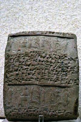 Hittite cuneiform court record with figures made with stamp or cylinder seal photo by Dick Osseman