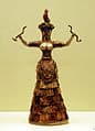 image Minoan statue of either a snake priestess or snake goddess showing the importance of snakes in ancient Mediterranean religions © George Groutas Wikimedia Commons 